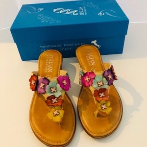 Italian shoemaker flower leather wedges.